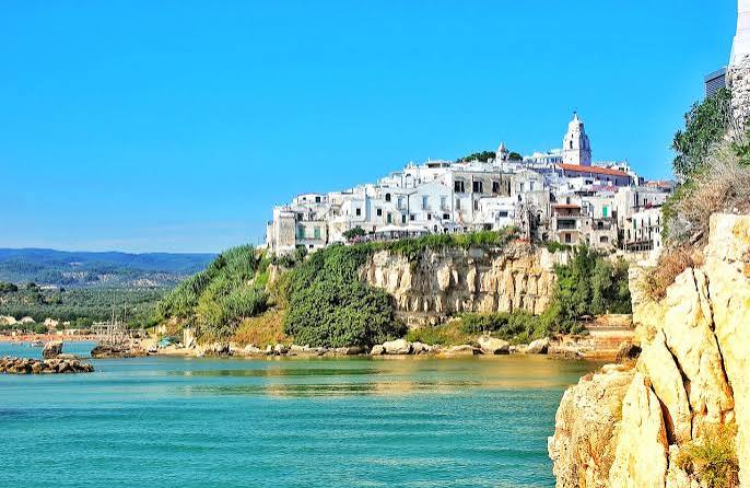 Vieste by daylight, the white town above the turquoise water